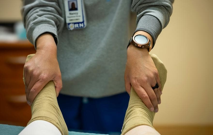 A clinician treating a patient
