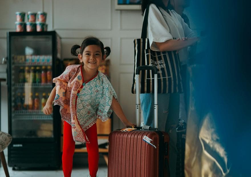 A family packing for a trip abroad
